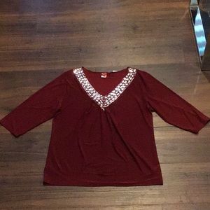 Fashion One Top in a Deep Burgundy color with Sequin/Ribbon details. Runs small